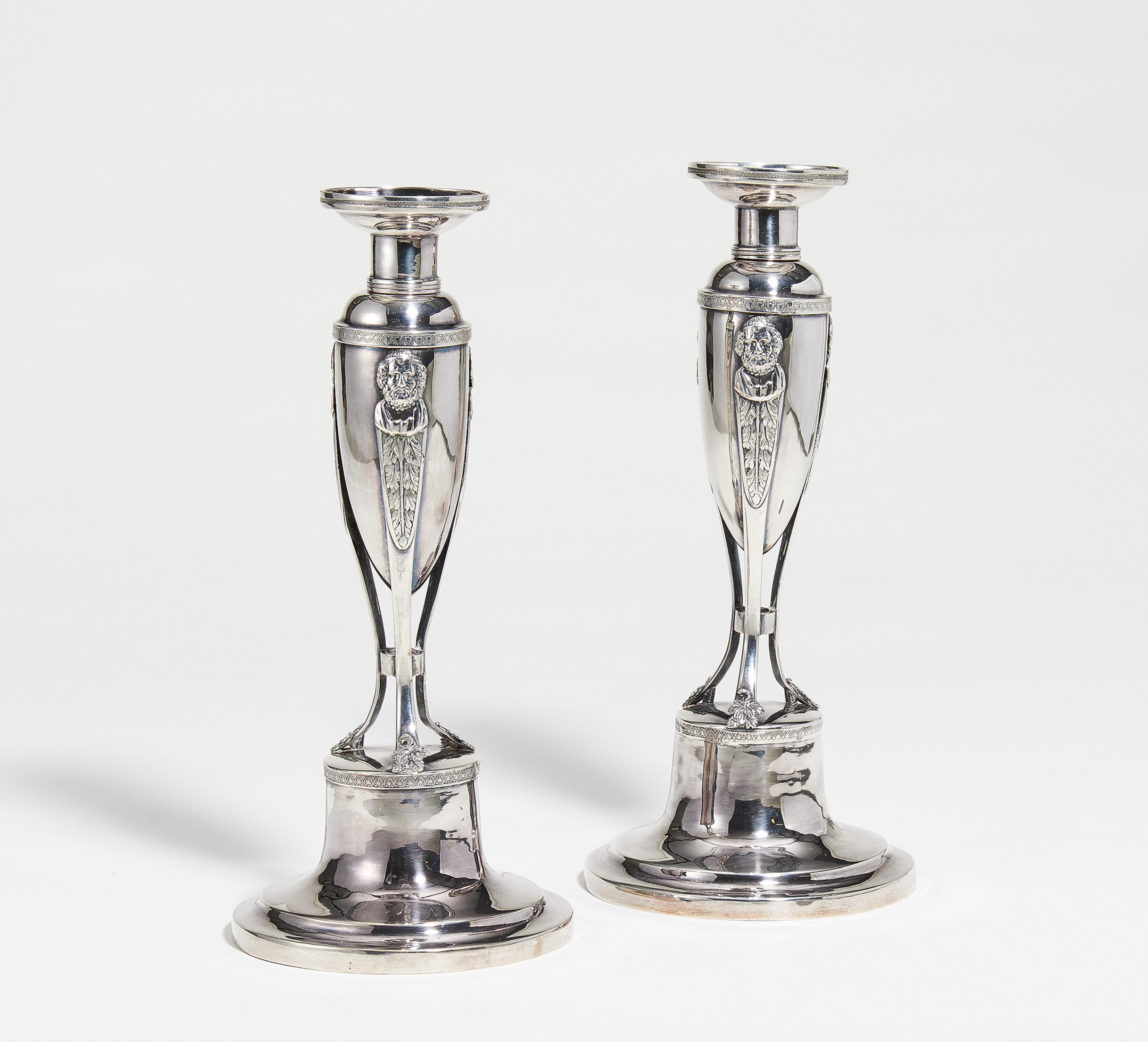 Pair of silver Empire candlesticks with Hermes décor