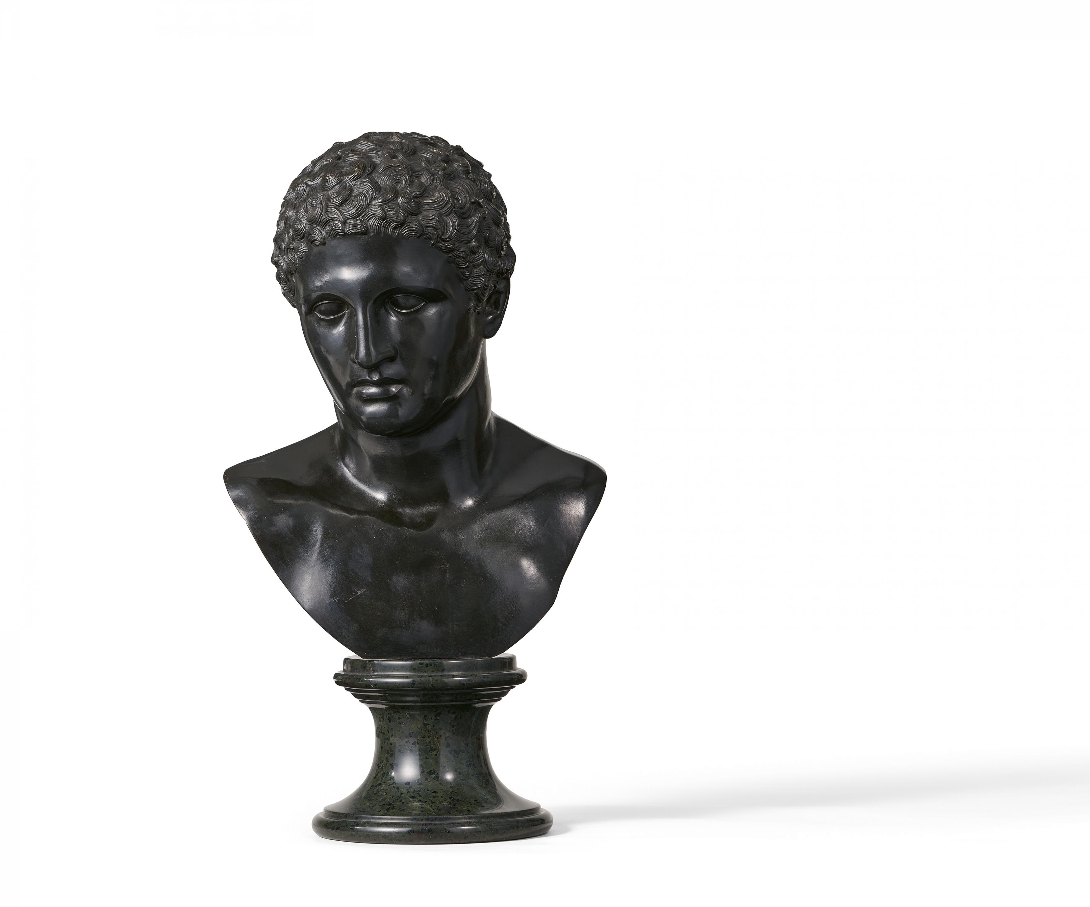 COPY OF AN ANTIQUE BRONZE BUST OF A YOUNG BOY.