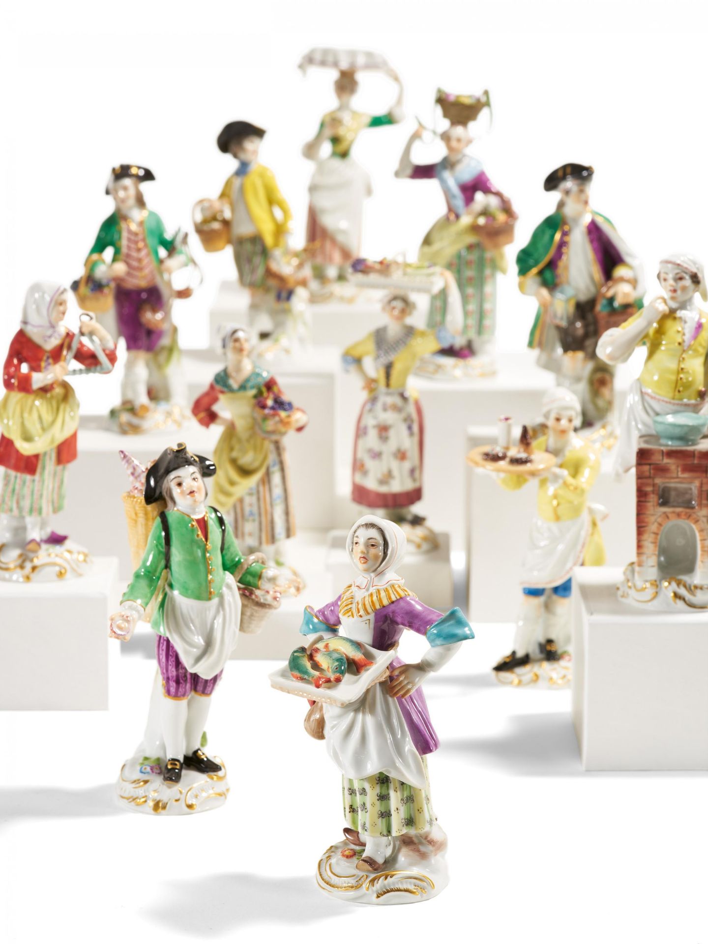 12 porcelain figurines from a series "Cris de Paris"