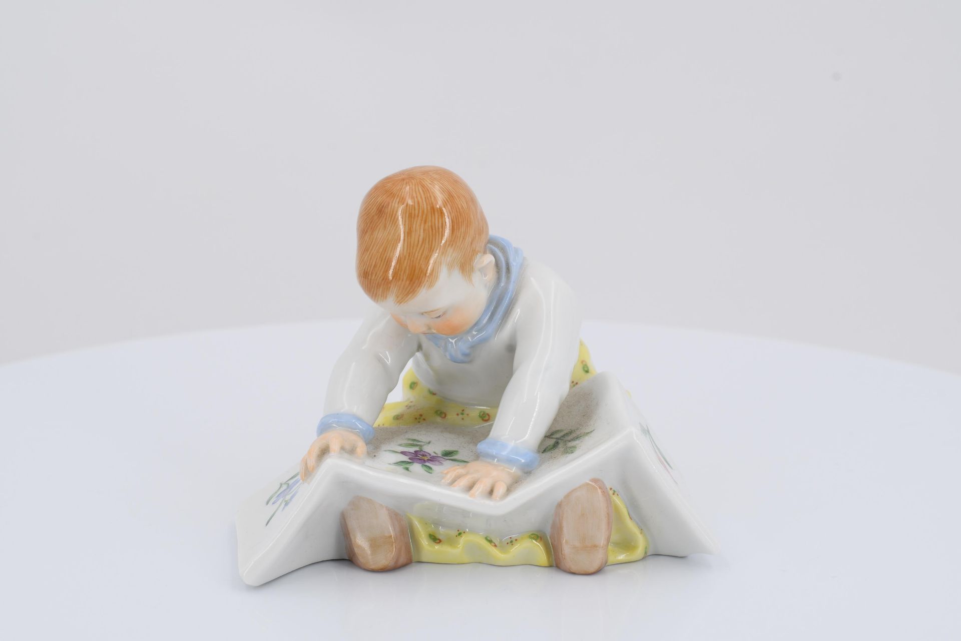 Porcelain figurine of child with picture-book - Image 2 of 6