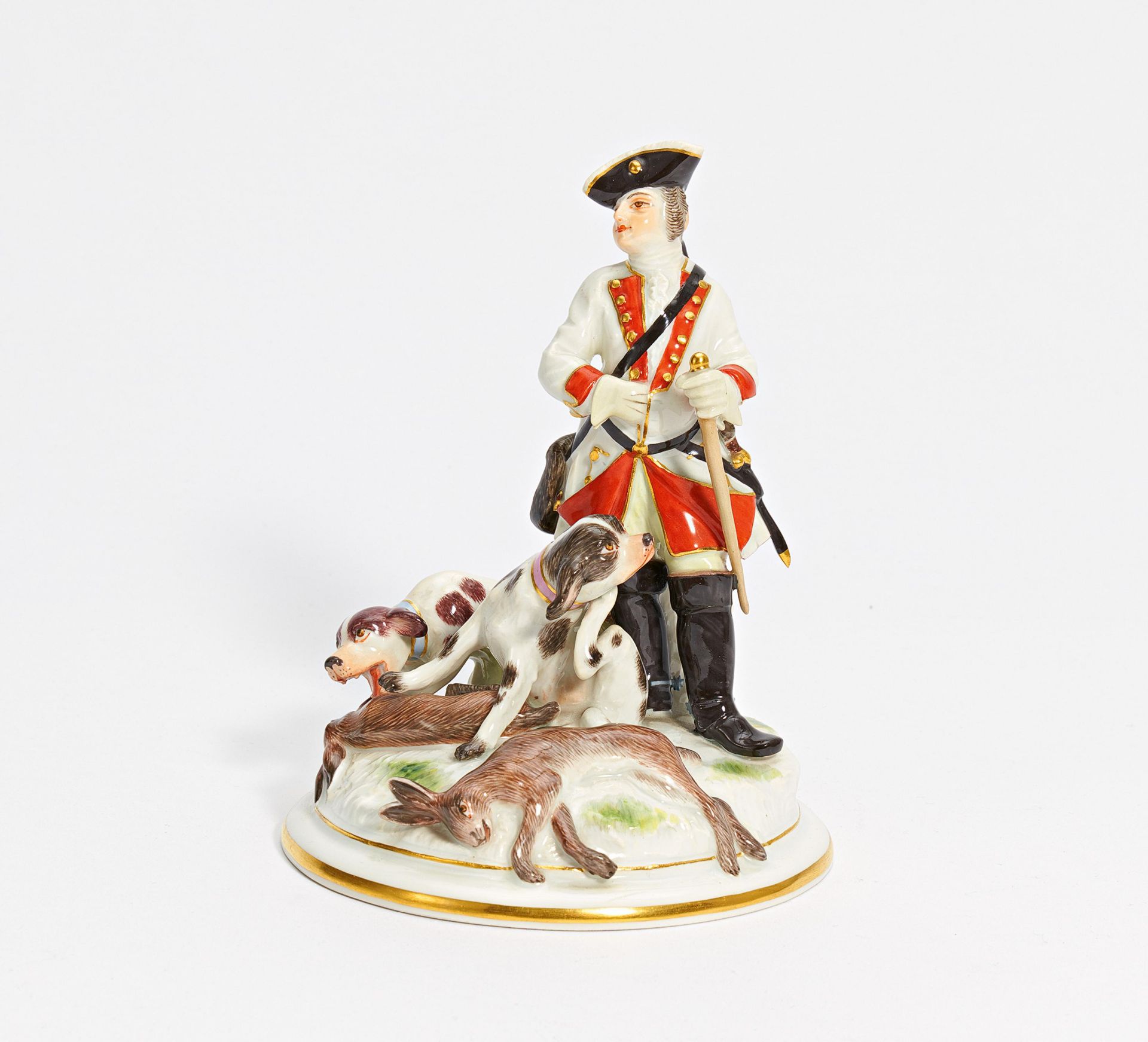 Porcelain ensemble of hunter with slain rabbit