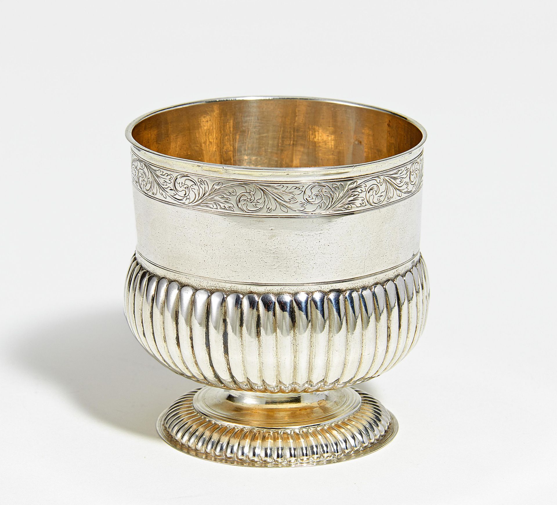 Footed silver beaker with gadrooning