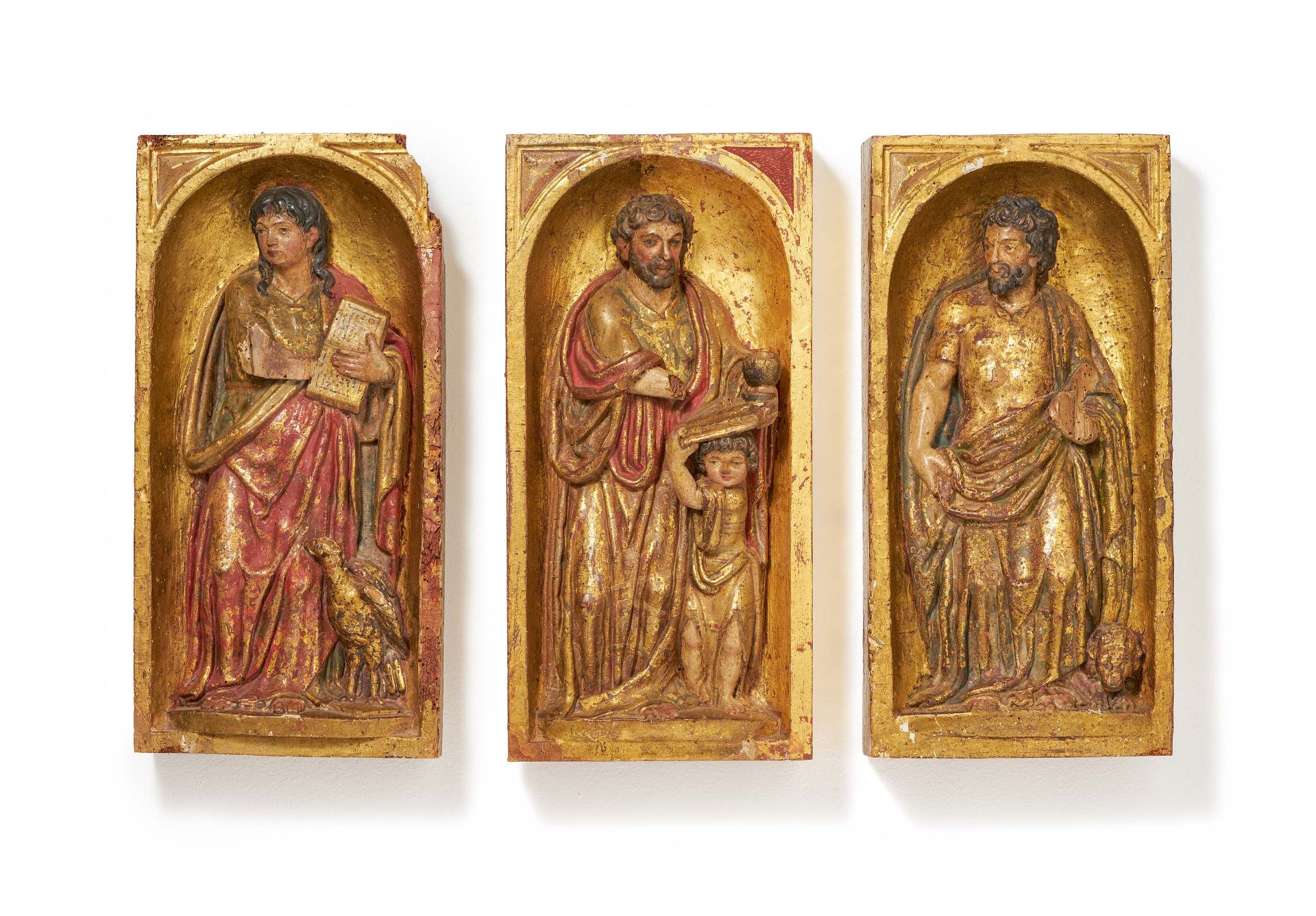 Spanish School: Three Woodcarvings from a Polyptych: The Evangelists Mark, John and Matthew.