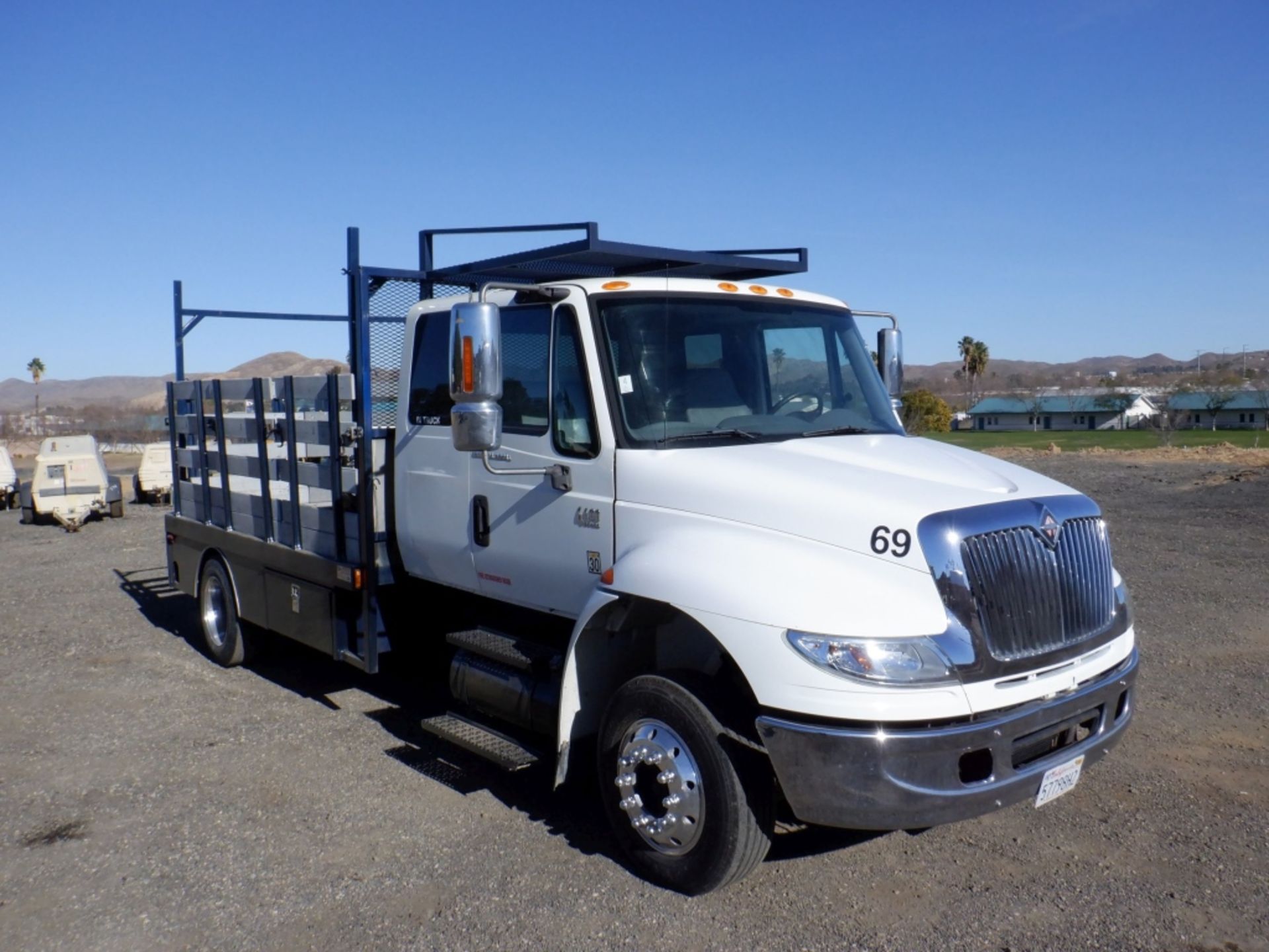 International 4400 Extended Cab Flatbed Truck