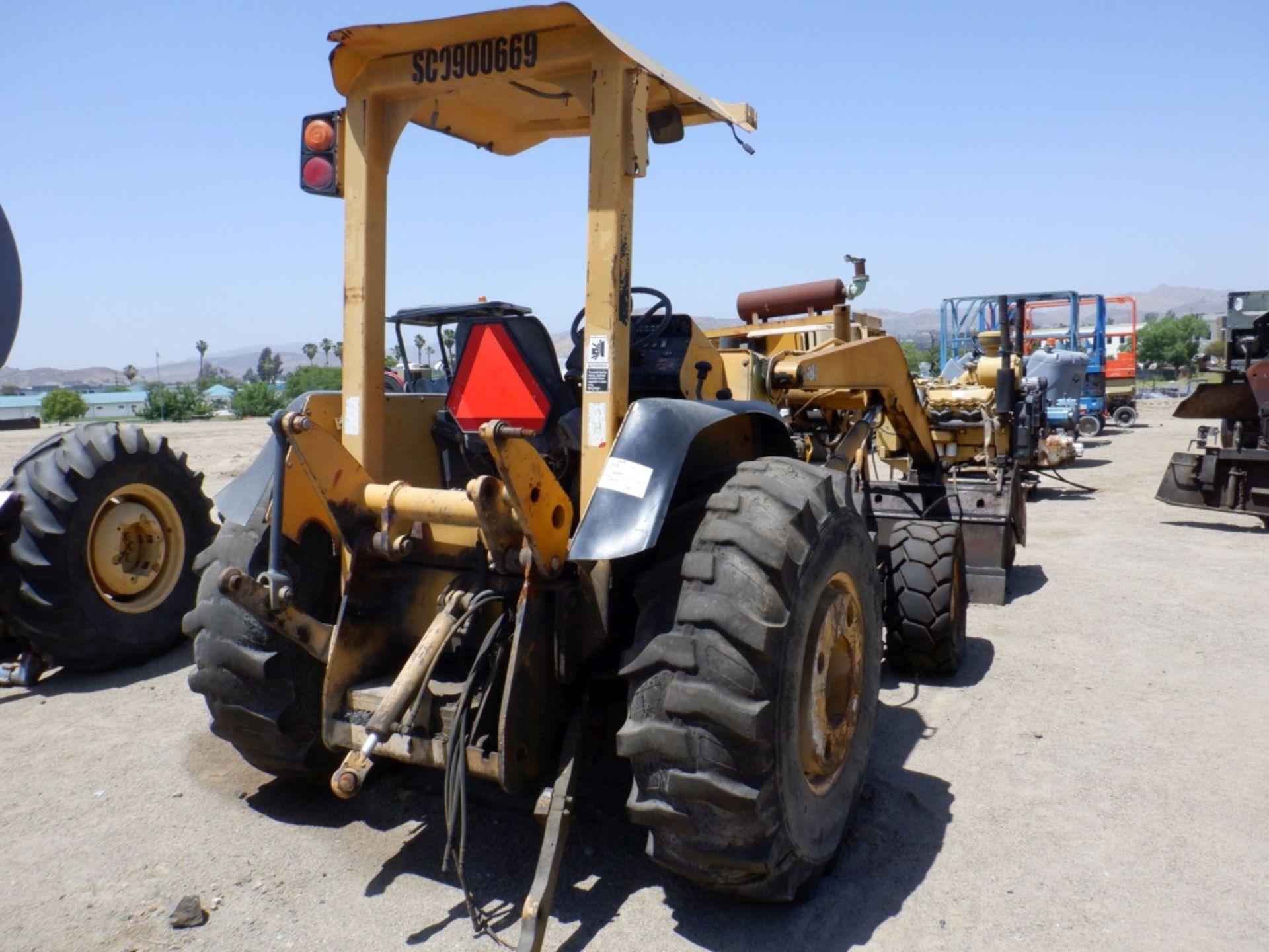 John Deere 210LE Skip Loader,