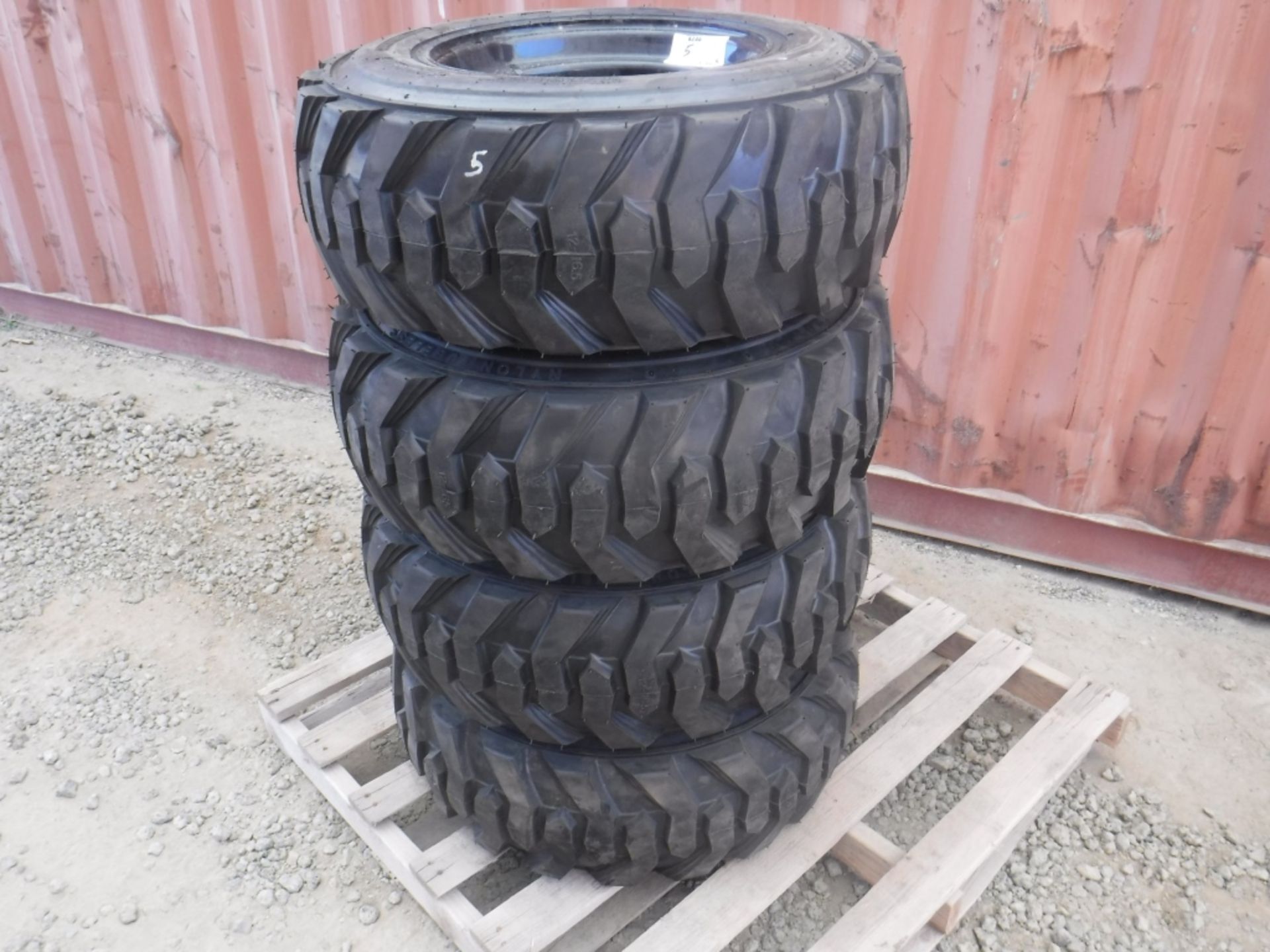 (4) Unused 12x16.5 Skid Gear Tires & Rims.