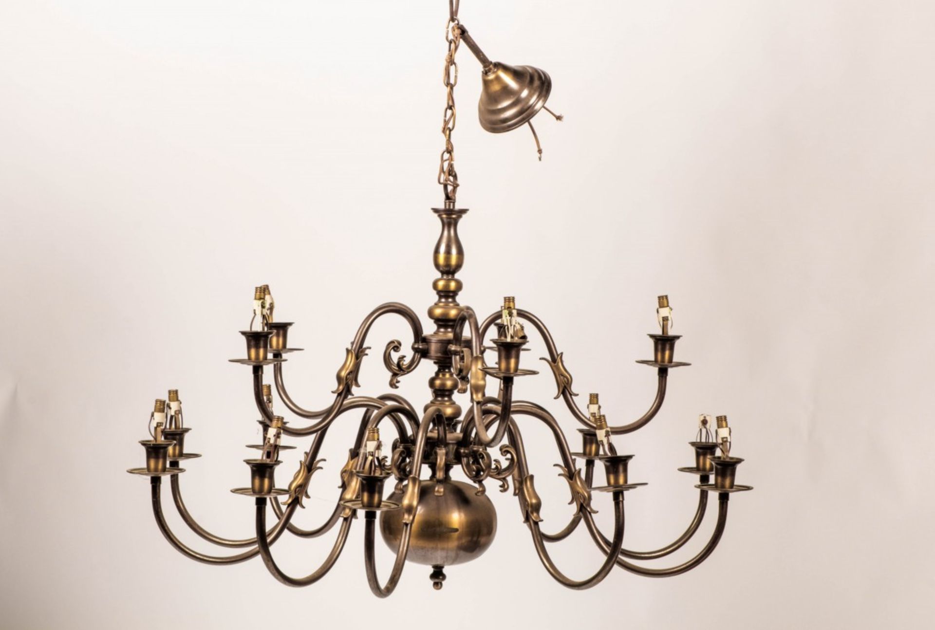 A set of (2) identical bronzed brass chandeliers, Dutch, 2nd half 20th century.