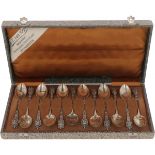 (12) Piece set of teaspoons in original silver pouch.