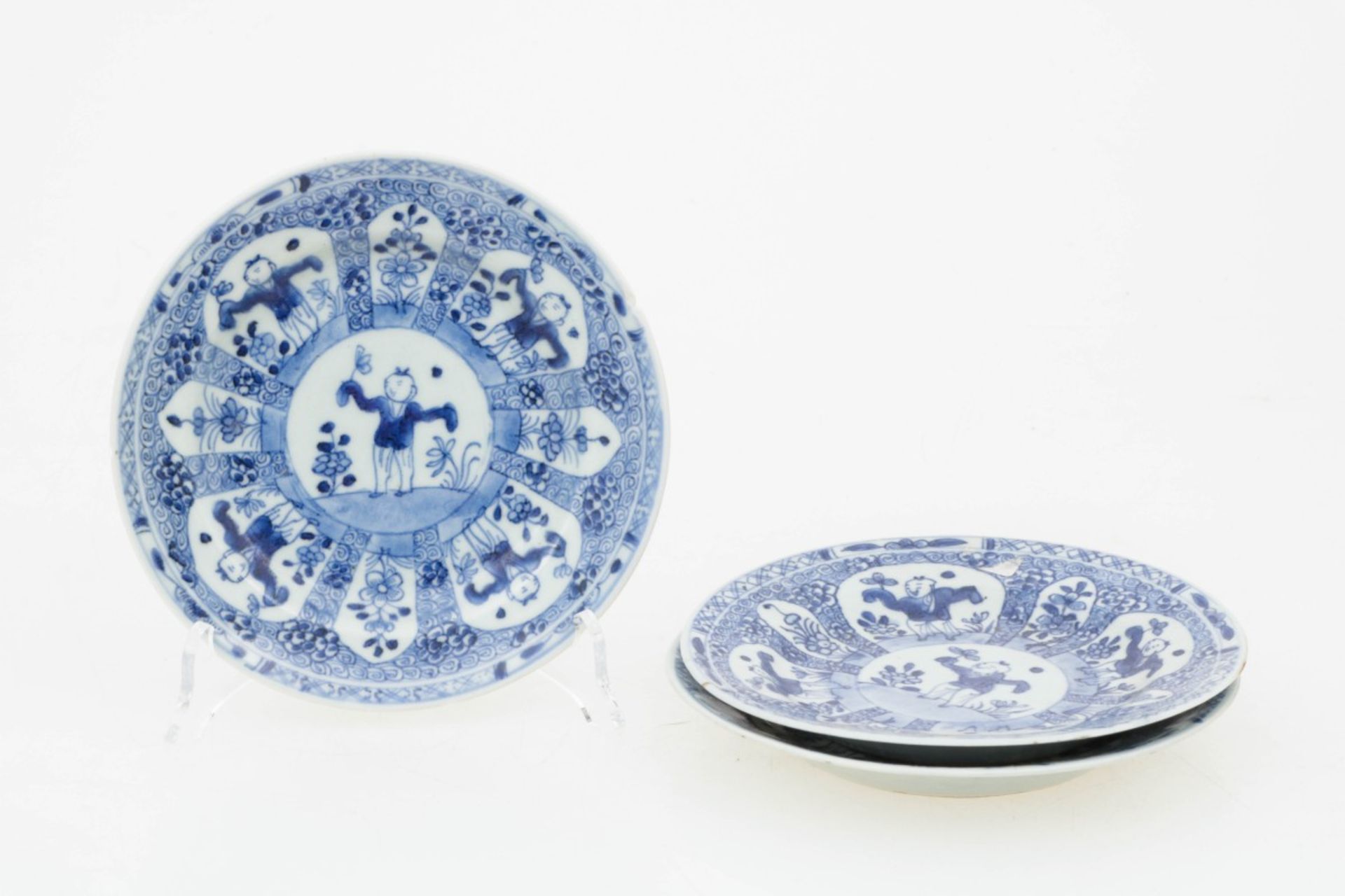 A set of (3) porcelain plates decorated with fools. China, 18th century.