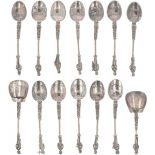 (14) Piece lot apostles teaspoons, sugar scoop and tea thumb silver.