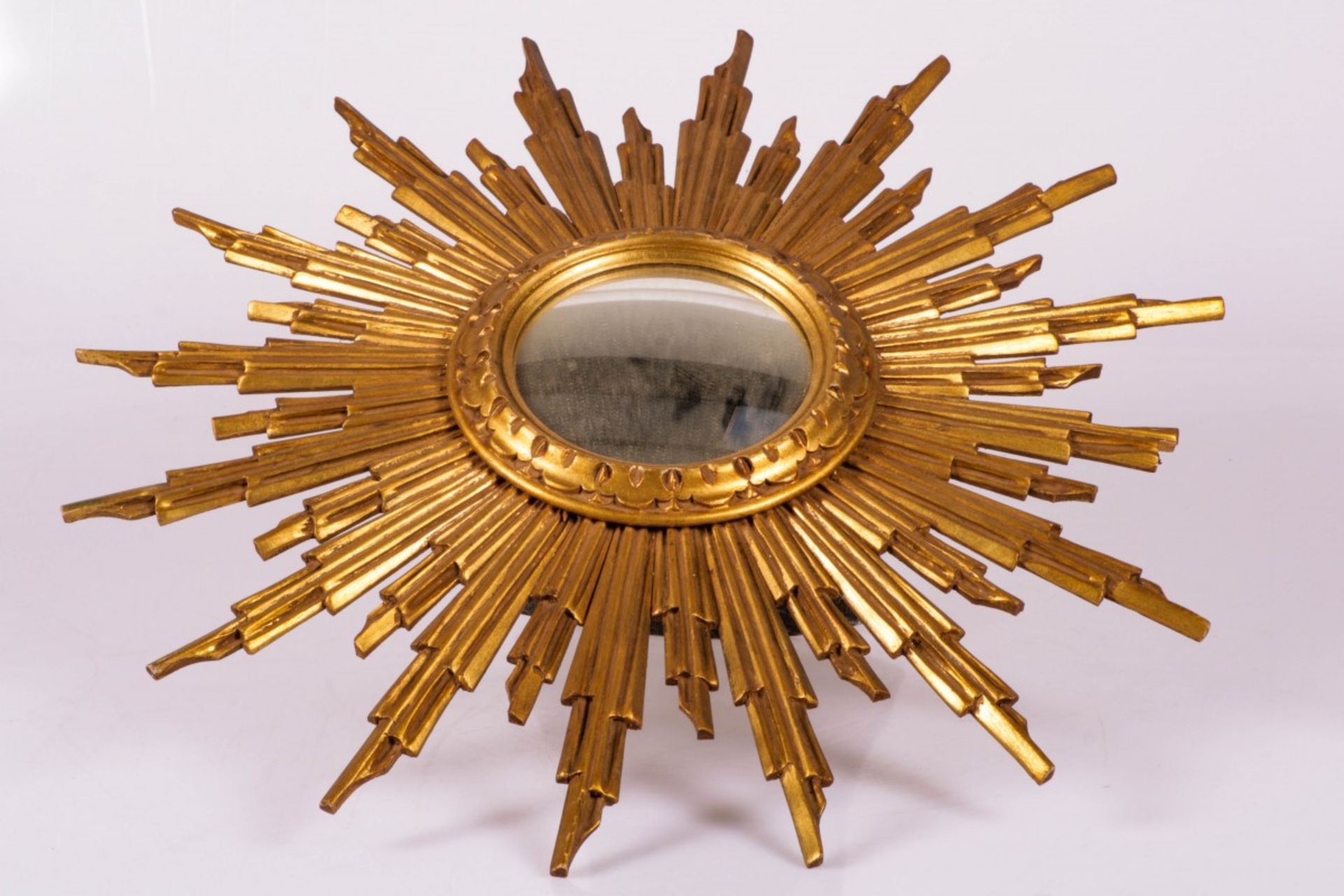A sunburst mirror, Belgium, 20th century.