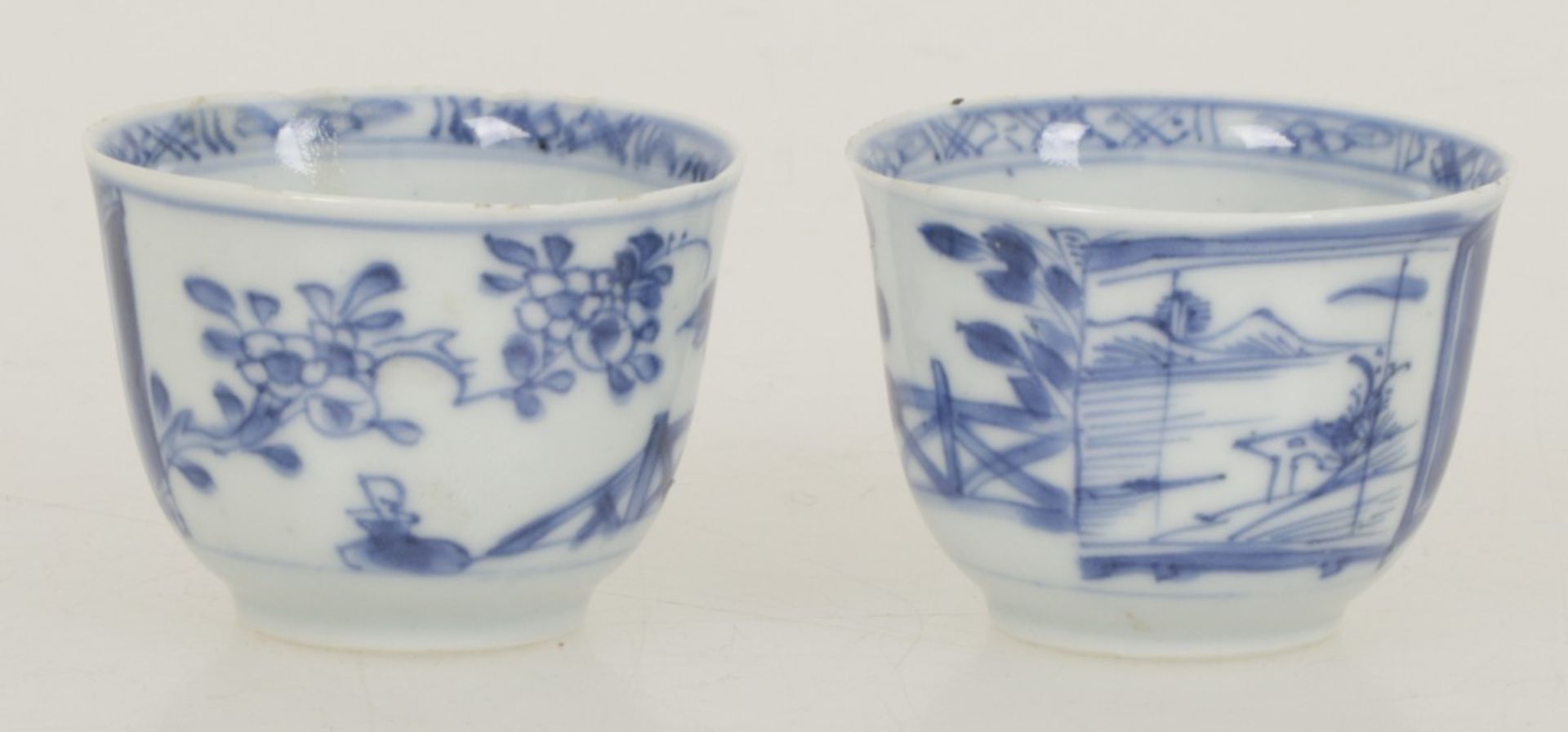 A set of two porcelain cups with landscape decor. China, 18th century.