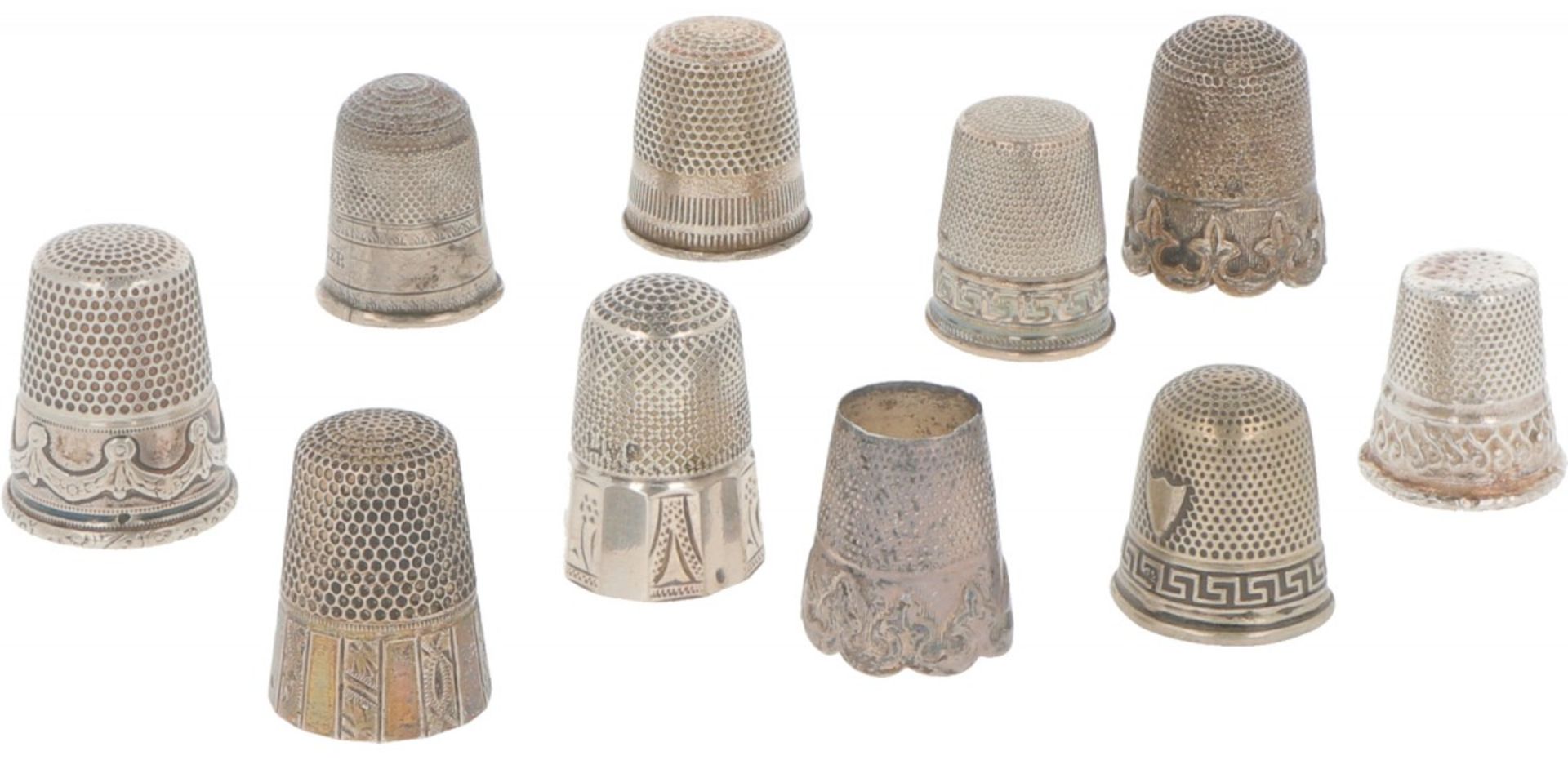 (10) Piece lot of silver thimbles.