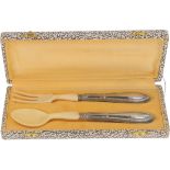 (2) Piece silver cutlery set.