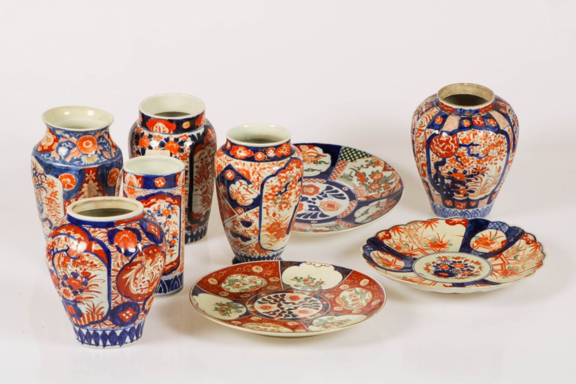 A lot of various porcelain with Imari decor including dishes and vases