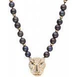 Yellow gold necklace with a feline shaped pendant, with approx. 1.06 ct. diamond, natural sapphire a