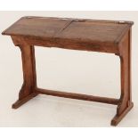 A pinewood, stained school desk for two., ca. 1920.