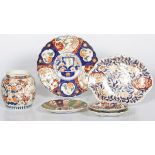 A lot comprising (6) Imari saucers, chargers and a vase, 19th century and later.