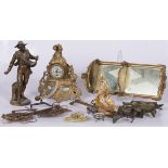 A lot comprising a ZAMAC clock, ditto statues and cast bronze desk sets, 19th century and later.