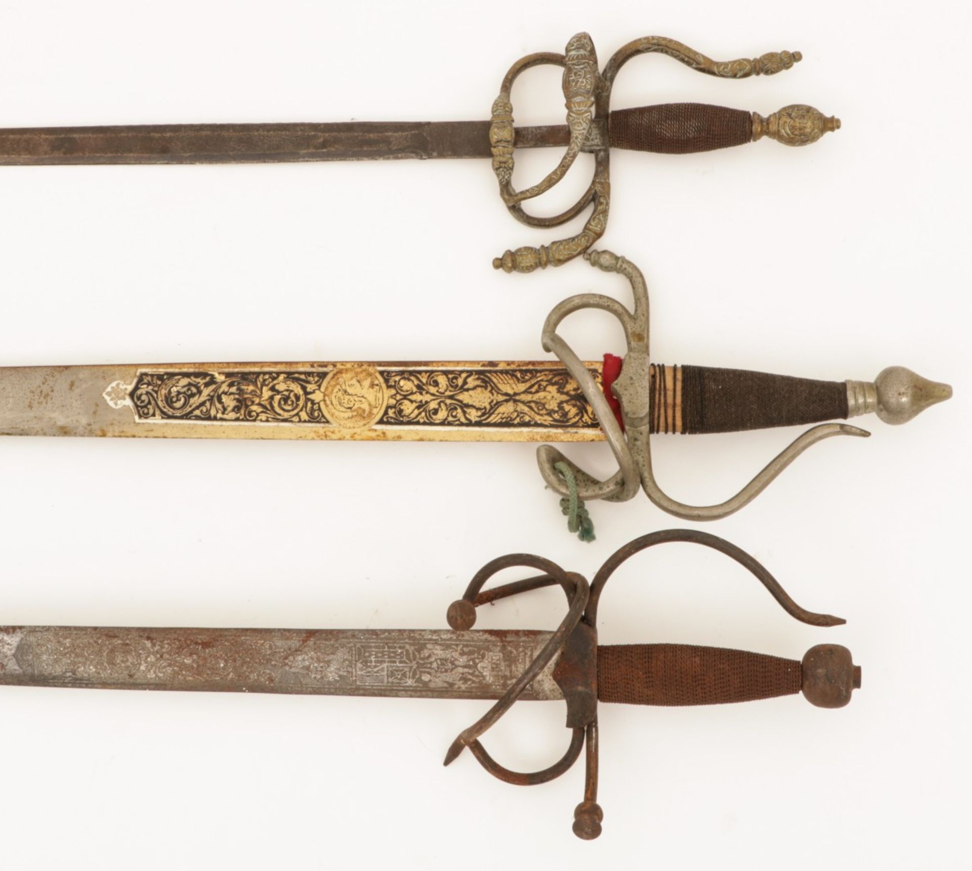 A lot with (3) various rapiers, 19th century.