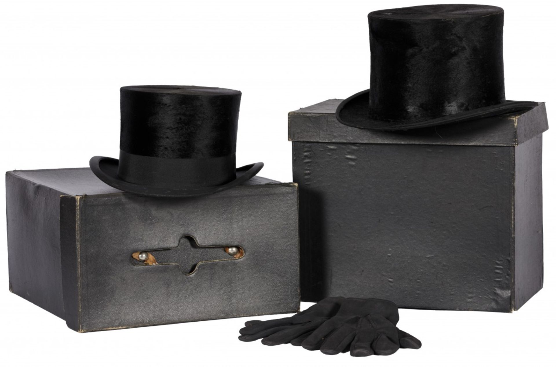 A lot with (2) various top hats, England and U.S., 20th century.