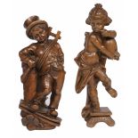A lot of (2) carved wooden children's figures, Germany, 20th century.