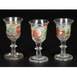 A set of (3) cold-painted liquor glasses, 19th century.