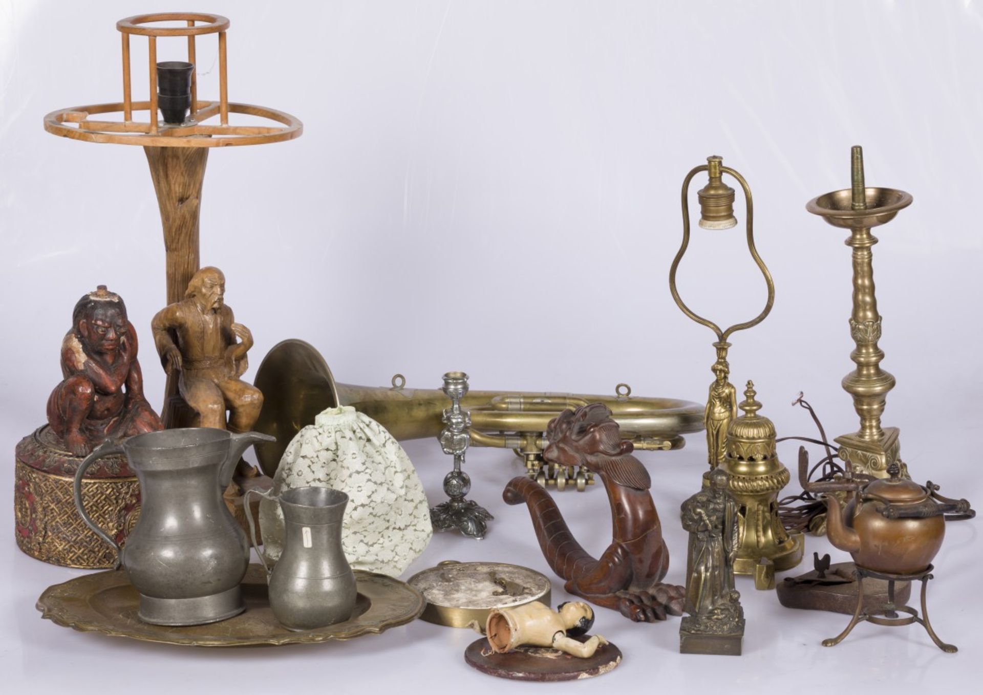 A lot miscellaneous a.w. a pricket candlestick and a trombone, 20th century.