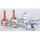 A lot comprising various porcelain items, a.o. (2) Satsuma stem vases.
