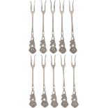 (10) piece set of cocktail picks, silver.