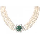 Three-row freshwater cultivated pearl necklace with a BLA silver closure set with green gemstones an