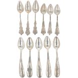 (11) piece lot with various coffee spoons in silver.