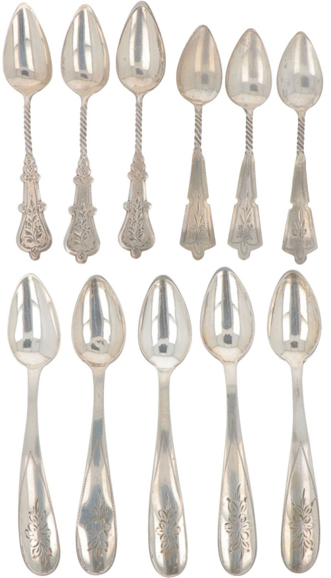 (11) piece lot with various coffee spoons in silver.