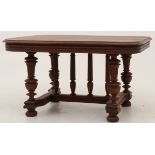 A mahogany dining table, England, last quarter 19th century.