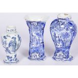 A lot comprised of (3) Delftware vases with European style motif, ca. 1800.