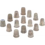 (15) Piece lot of silver thimbles.