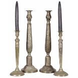 A lot comprised of (4) silvered candlestick holders, 20th century.