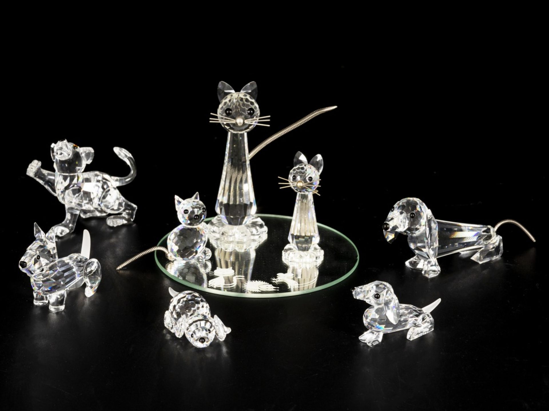 (9) piece lot of Swarovski miniatures.