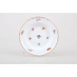 A porcelain plate with floral decor. Meissen, 1st half of the 20th century.
