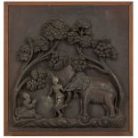 A carved wooden relief plaque decorated with figures in a landscape, Burma, 20th century.