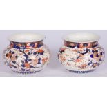 A set of (2) porcelain flower pots with Imari decoration, Japan, late 19th century.