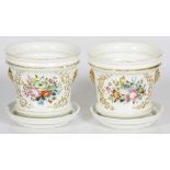 A lot of (2) porcelain cachepots with saucer, France, 19th century.