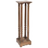 A wooden pedestal/ plant table, 20th century.