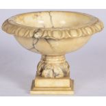 A white marble tazza with decorative egg-and-dart rim, Italy, 2nd quarter of the 20th century.