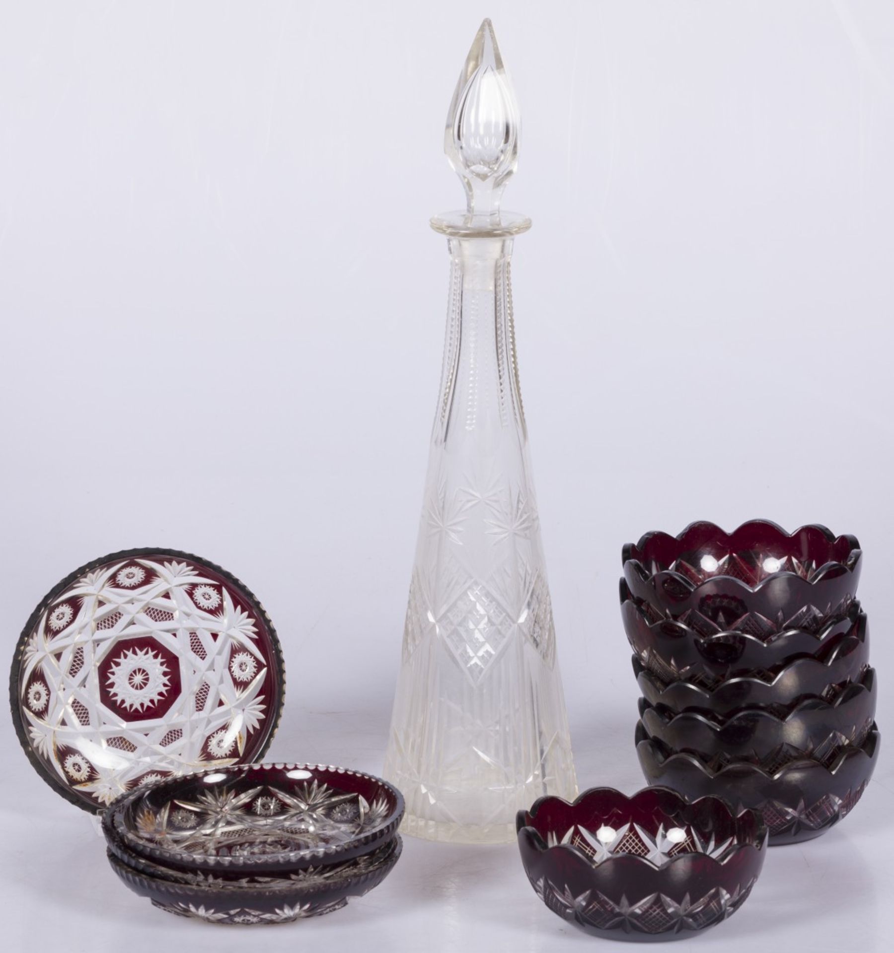 A clot comprising (6) "Bohemian" cut glass bowls, (3) ditto saucers, and one cut glass carafe, early