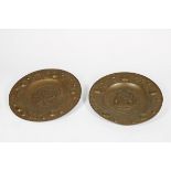 Two copper wall appliques, hammered with allegorical depictions of summer and winter, 20th century.