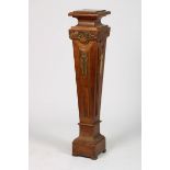 A wood pedestal, 20th century.