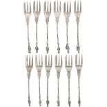 (12) piece set of cake forks with apostles silver.