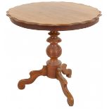 A mahogany round table on tripartite legs, Dutch, 20th century.