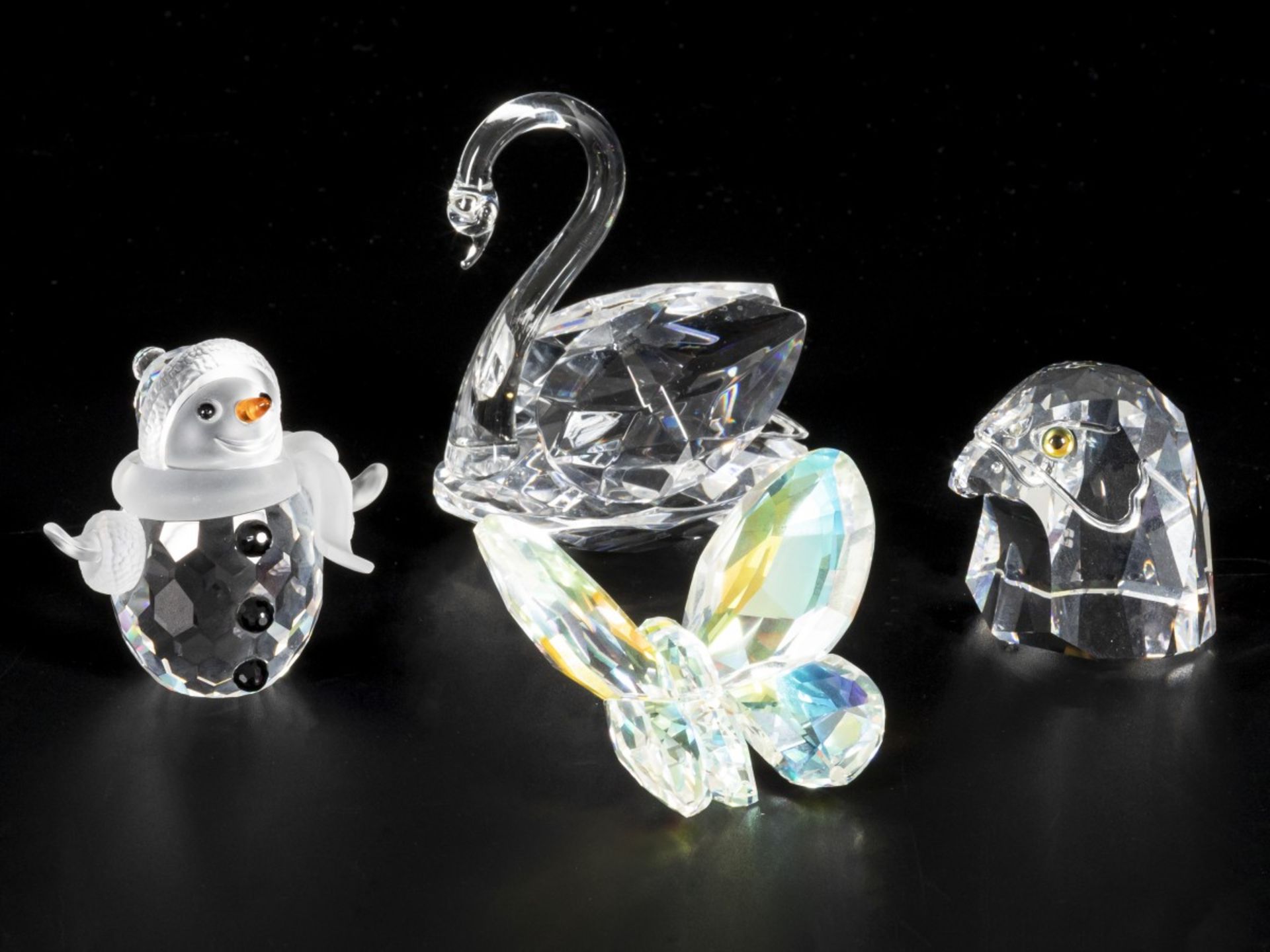 (4) Part lot Swarovski miniatures.